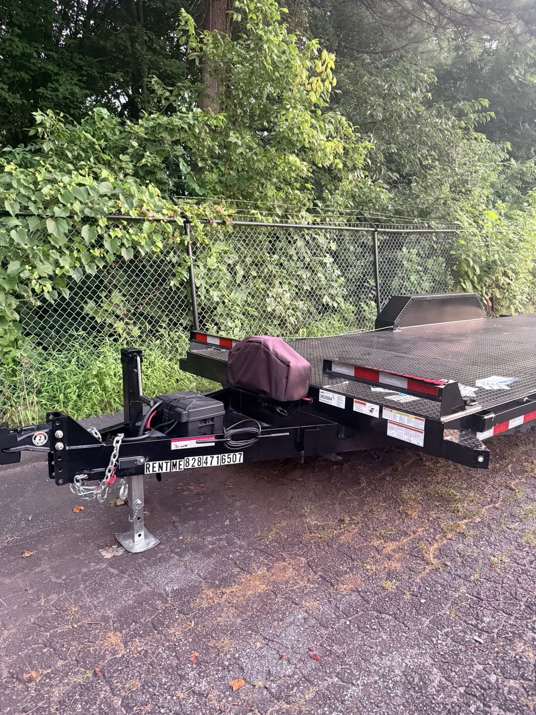 Front of the trailer showing the coupler, jack stand, and tongue